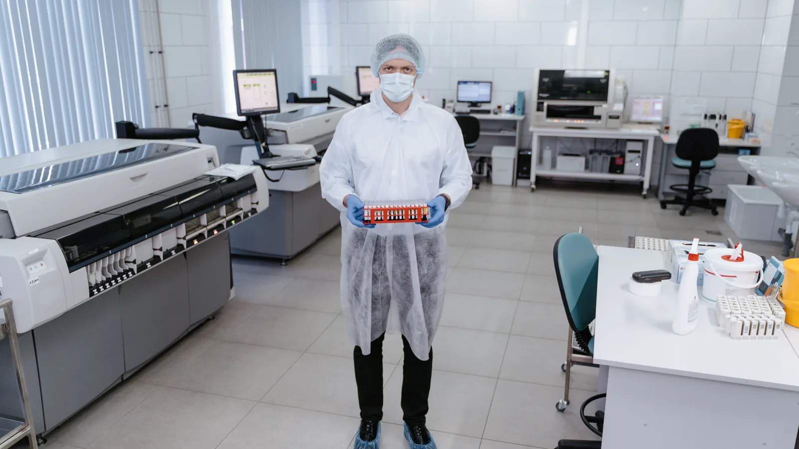 A sample under load in a materials testing rig