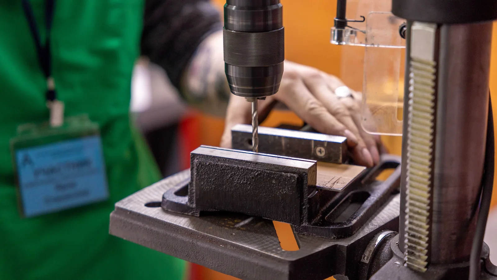 A hand lever on a workshop press - the smallest control on the largest machine