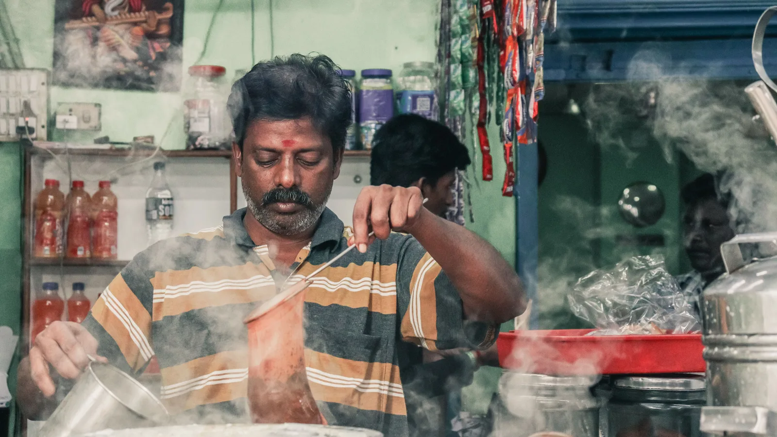 A glass of chai at a roadside stall, the single unit the business repeats
