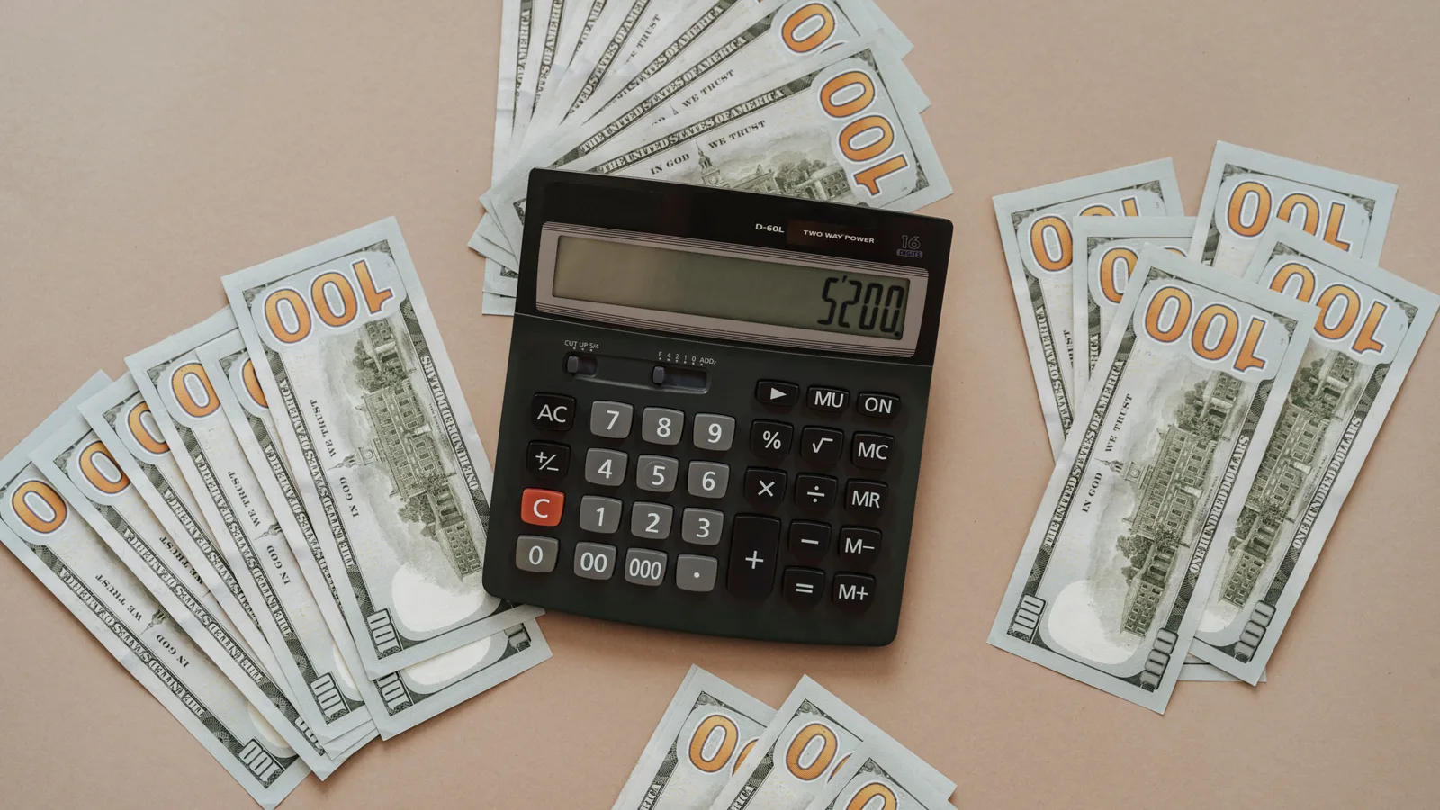 Invoices spiked on a counter, more of them than anyone has reconciled